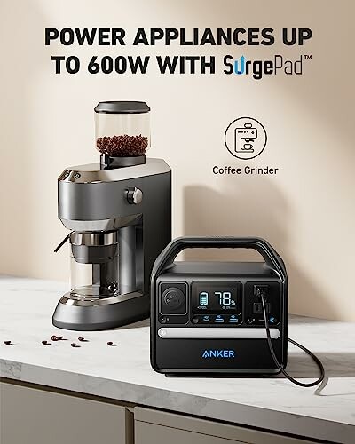 Anker power station powering a coffee grinder on a table.