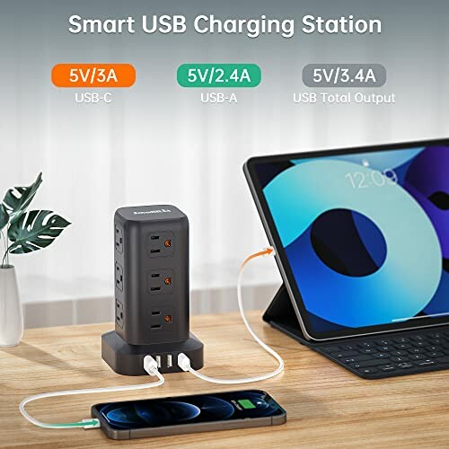 Smart USB charging station with multiple ports charging a phone and tablet.